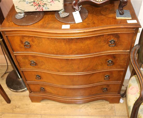 A walnut serpentine chest of drawers, W.78cm